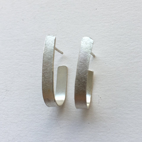 Textured silver modern hoop earring by Michele Wyckoff Smith