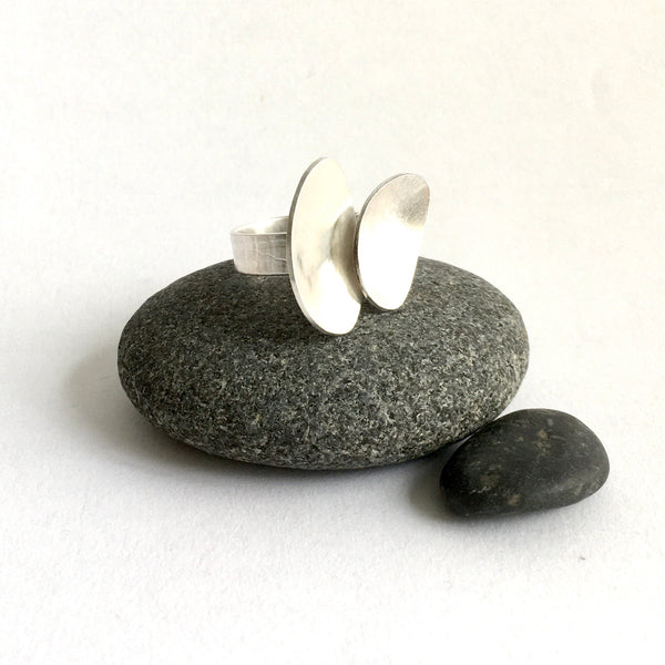 Side view on pebble of adjustable silver oval ring - www.wyckoffsmith.com