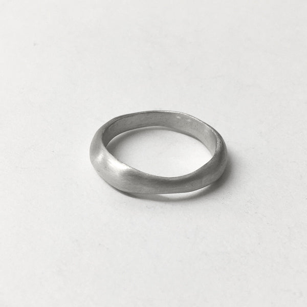 Organic shaped silver wedding ring on www.wyckoffsmith.com