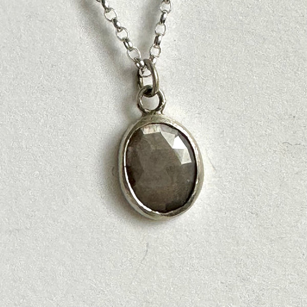 Faceted grey silky sapphire set in silver on belcher chain - www.wyckoffsmith.com