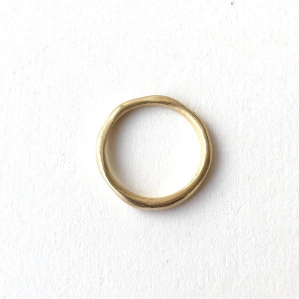 The perfect narrow organic shaped wedding band by Wyckoff Smith Jewellery