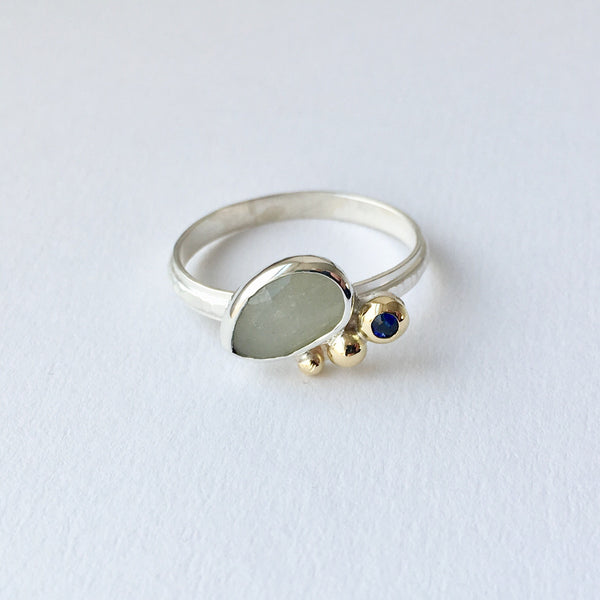 Grey and blue sapphire ring made in sterling silver with 18 ct gold balls.
