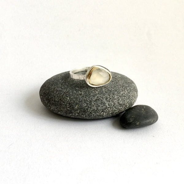 Front side view of grey moonstone ring set in 18 ct gold on a silver ring - www.wyckoffsmith.com
