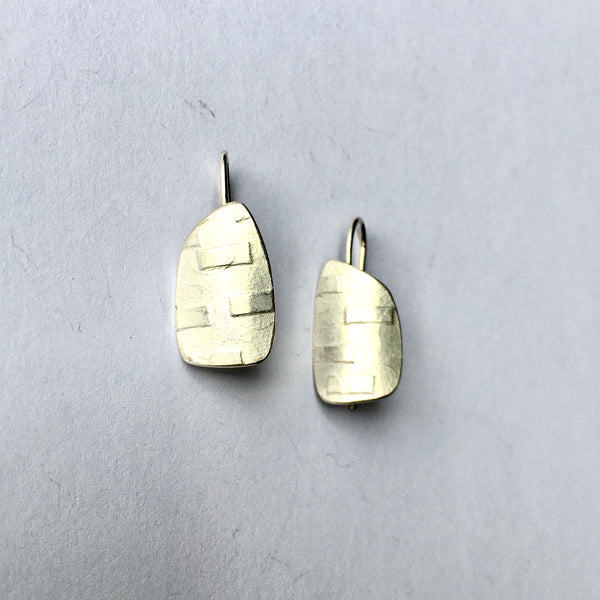 Side view of spinnaker earrings with horizontal sliding bar texture (option 2) on www.wyckoffsmith.com
