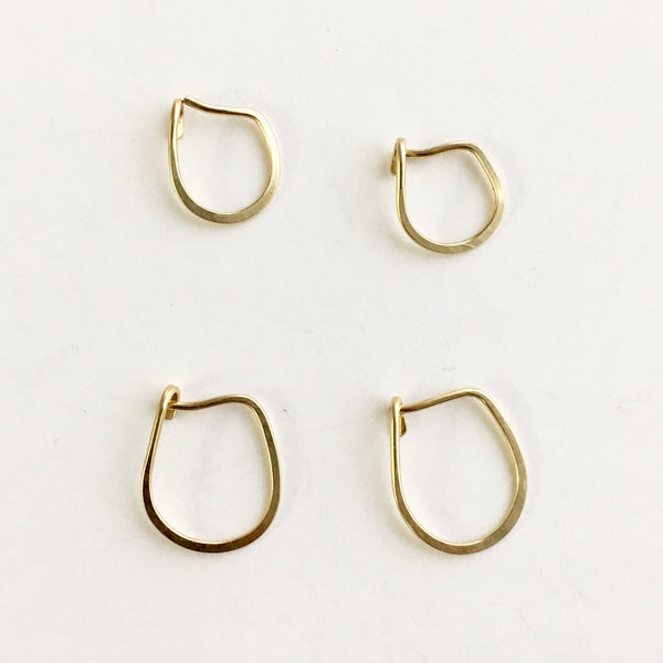 14 ct yellow gold hoop earrings (upper left is open) by Wyckoff Smith Jewellery