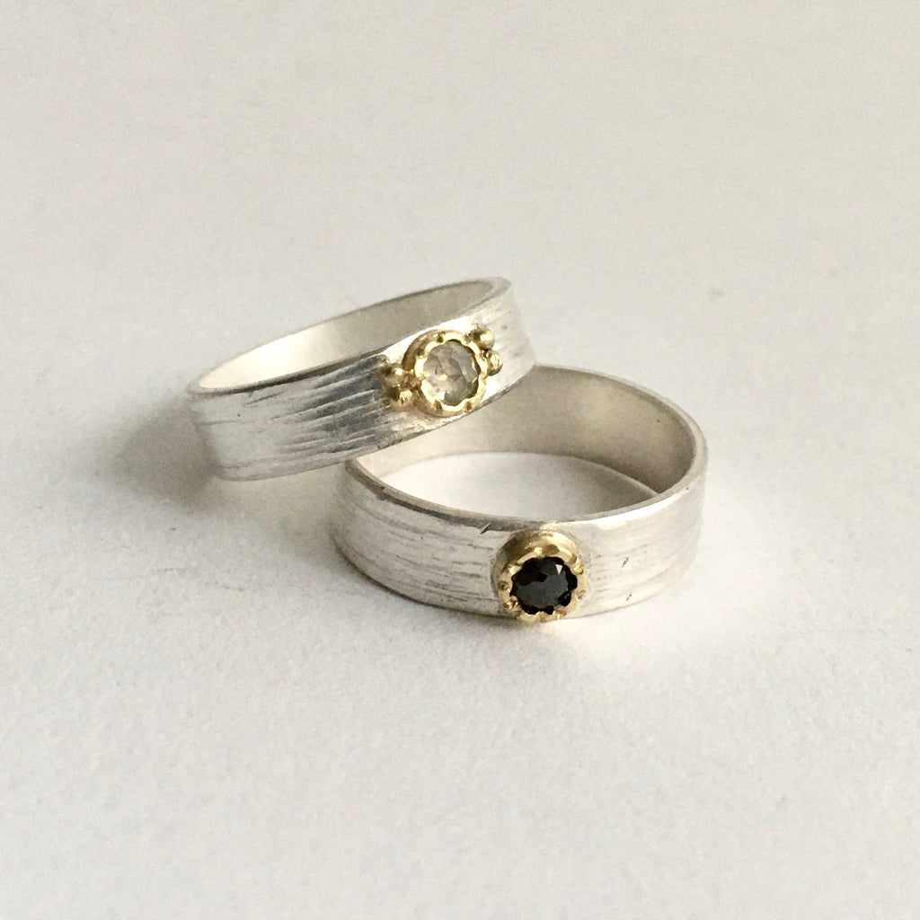 Two rose cut diamond rings set in 18 ct gold on silver bands stacked on top of each other - www.wyckoffsmith.com