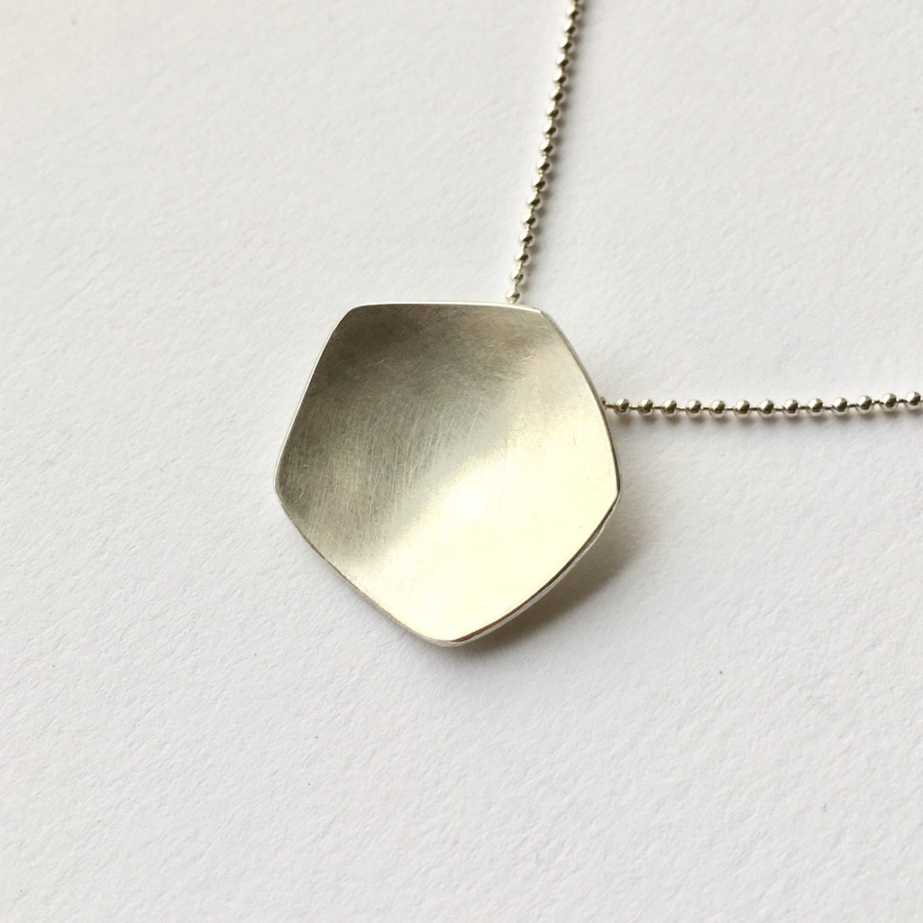 Calyx silver pendant inspired by the poppy by Michele Wyckoff Smith