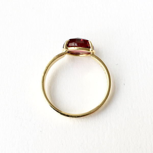 www.WyckoffSmith.com garnet and 18 ct gold ring with texture.