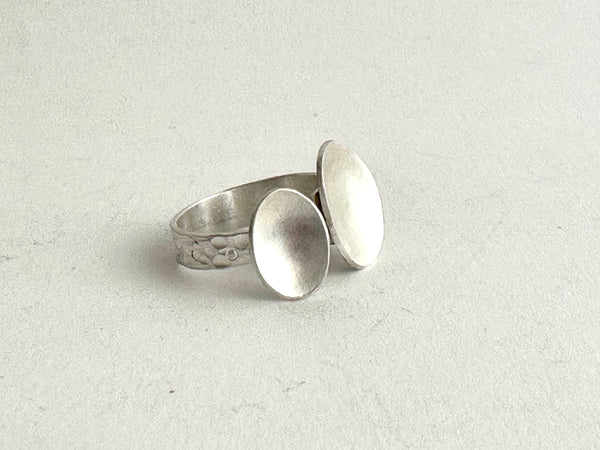 Open and adjustable oval ring with chased textured ring shank -  side view - www.wyckoffsmith.com