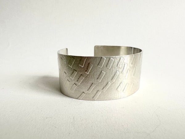 Side view of dash texture cuff bracelet - www.wyckoffsmith.com
