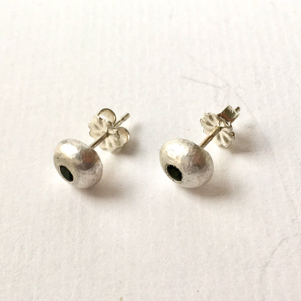 Side view of flush set recycled silver ball stud earrings by Michele Wyckoff Smith, Wyckoff Smith Jewellery