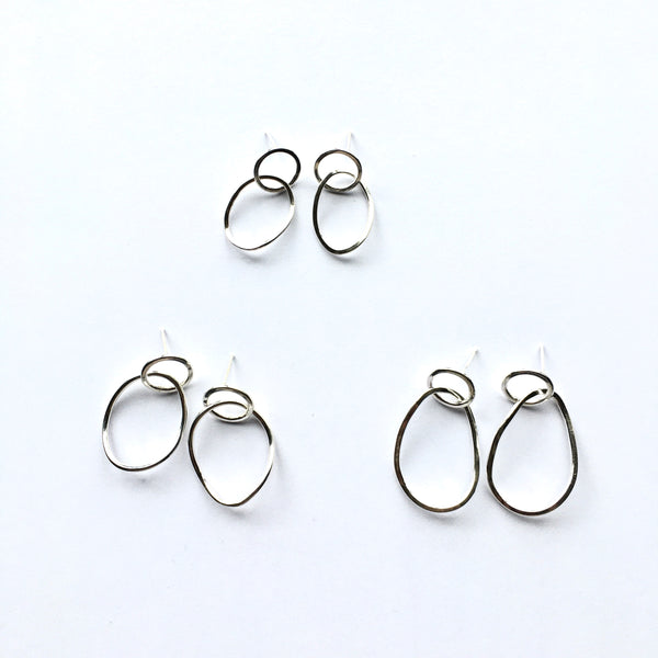 Three sizes of Silver Twisted Petal Stud Earrings on www.wyckoffsmith.com