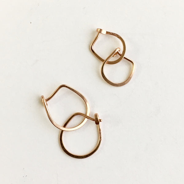 14 ct rose gold hammered hoops by Wyckoff Smith Jewellery