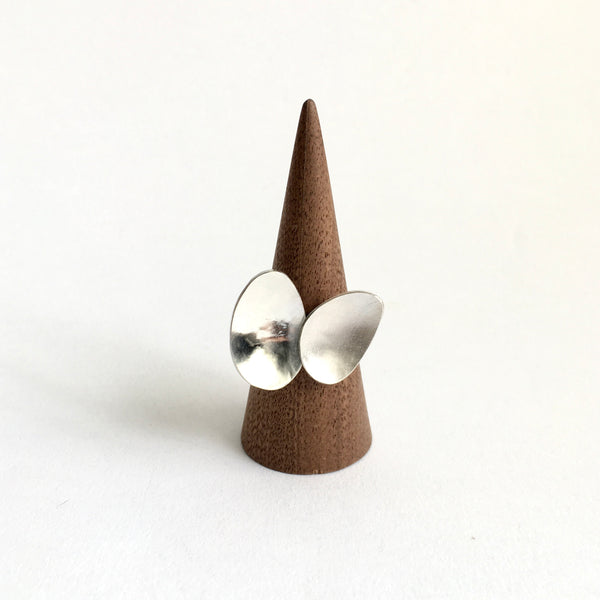 Adjustable organic shaped oval ring on wooden ring holder - www.wyckoffsmith.com