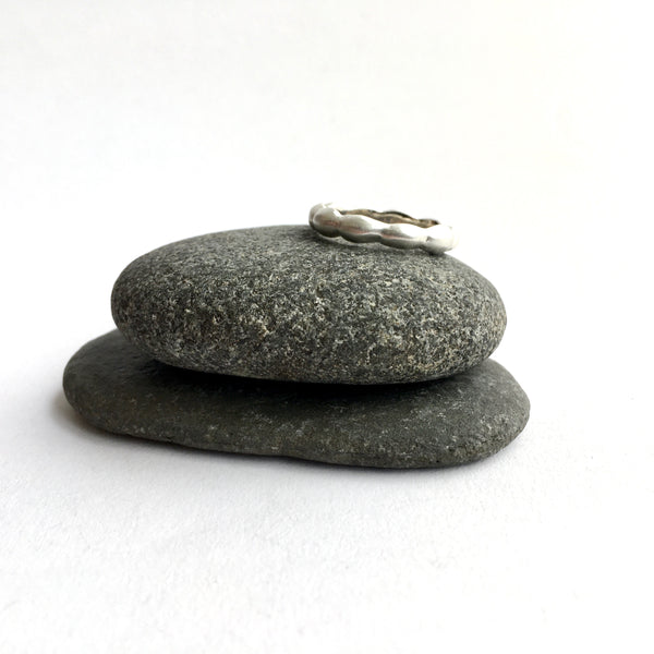 Kelp Ring on top of two pebbles on www.wyckoffsmith.com