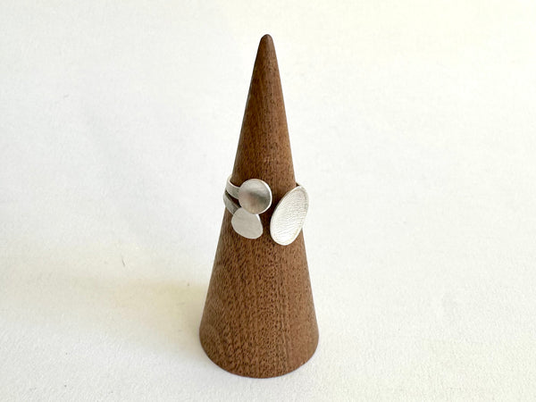 Small adjustable ring on wooden ring holder - www.wyckoffsmith.com